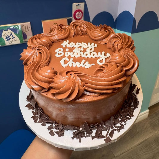 Chocolate birthday cake with an optional message written on top